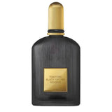 Flacon de parfum TIARA Tom Ford Black Orchid Reserve en verre noir cannelé avec plaque et bouchon dorés luxueux